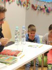 Kluby: Magia słów Michała Rusinka w Klubie Czytających Rodzin - Zdjęcie nr 18